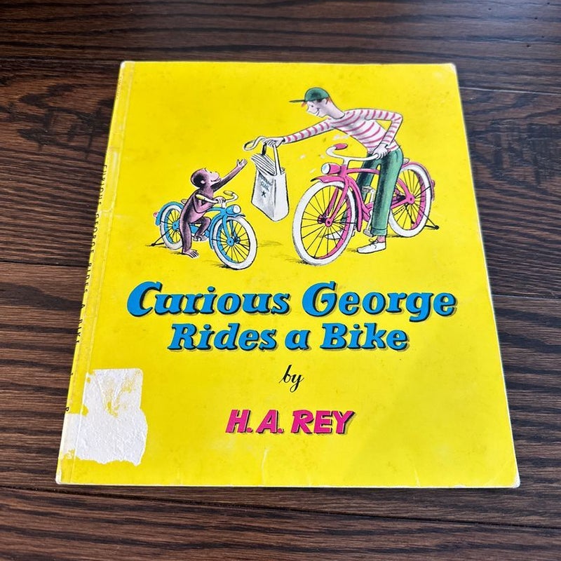 Curious George Rides a Bike