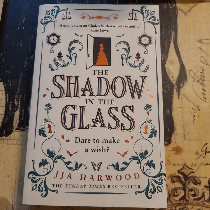 The Shadow in the Glass