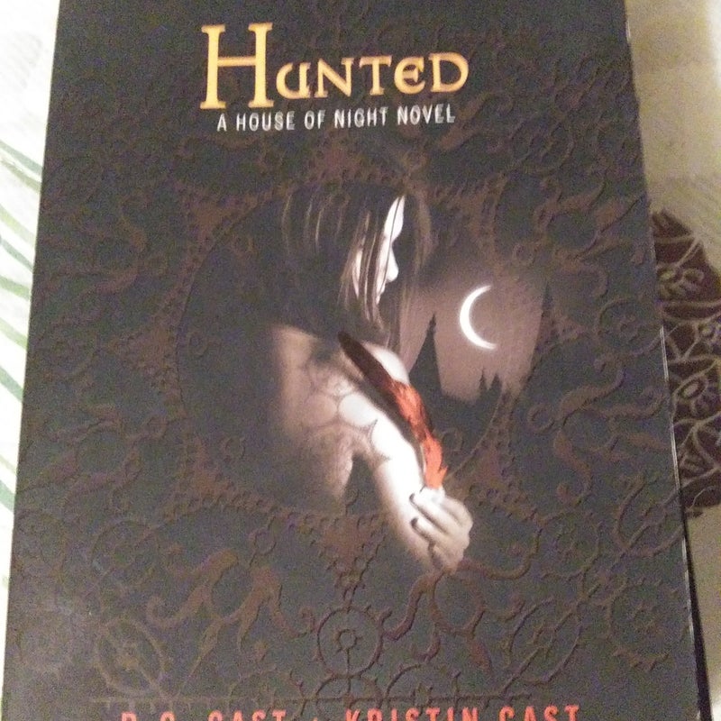 Tempted (Hardcover) And Hunted (softcover)