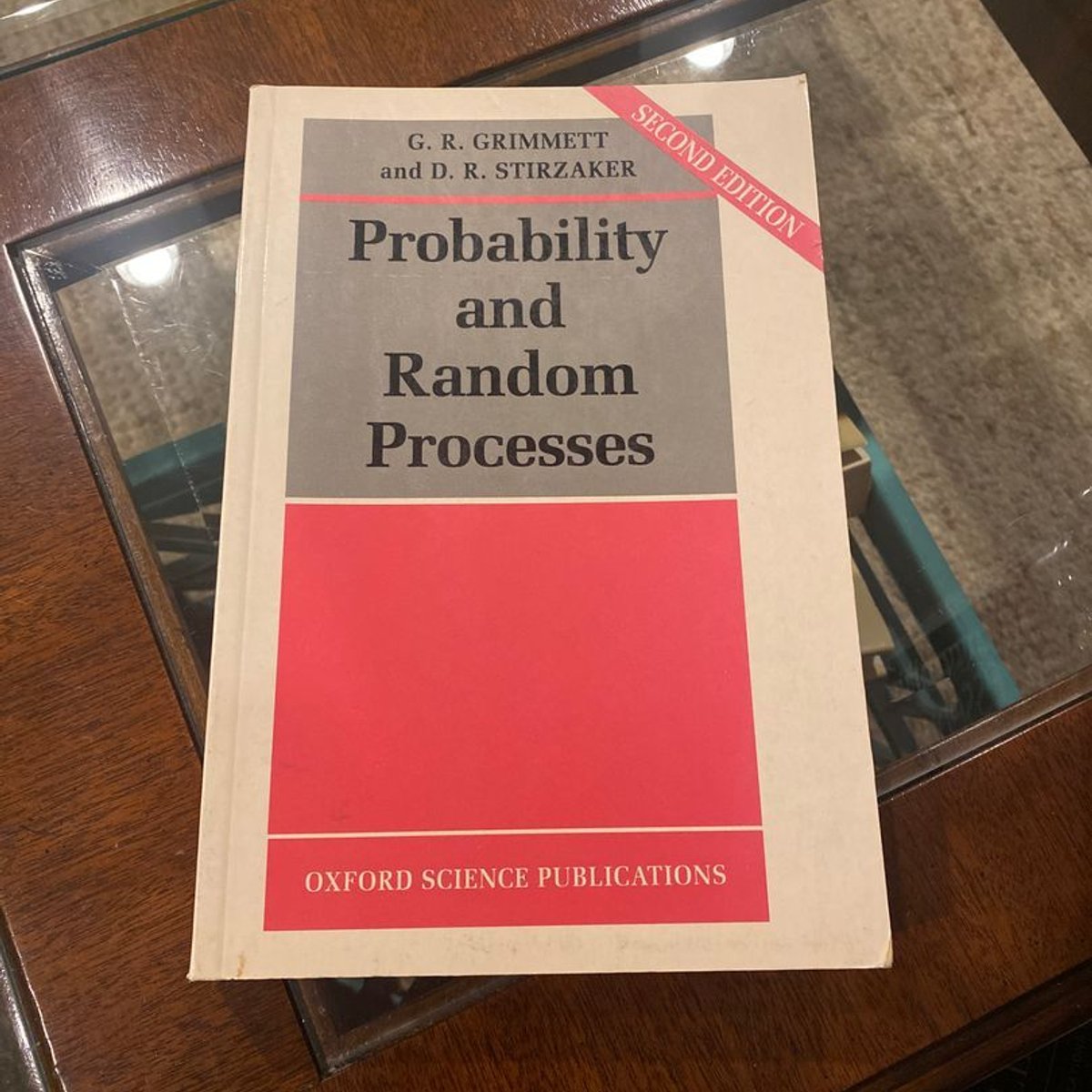 Probability and Random Processes by Geoffrey Grimmett, David Stirzaker