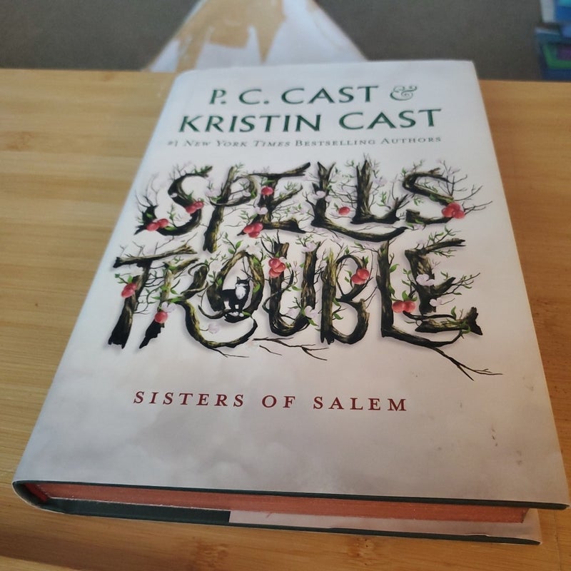 Spells Trouble Signed bookplate w/Sprayed metallic and stenciled edges matching cover! 