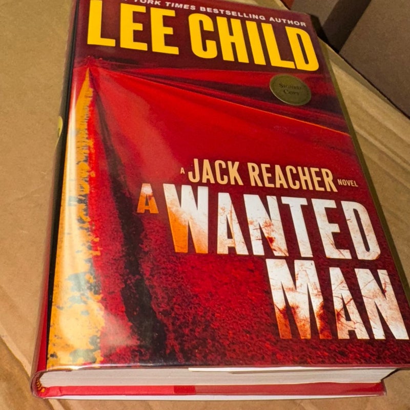 A WANTED MAN SIGNED 