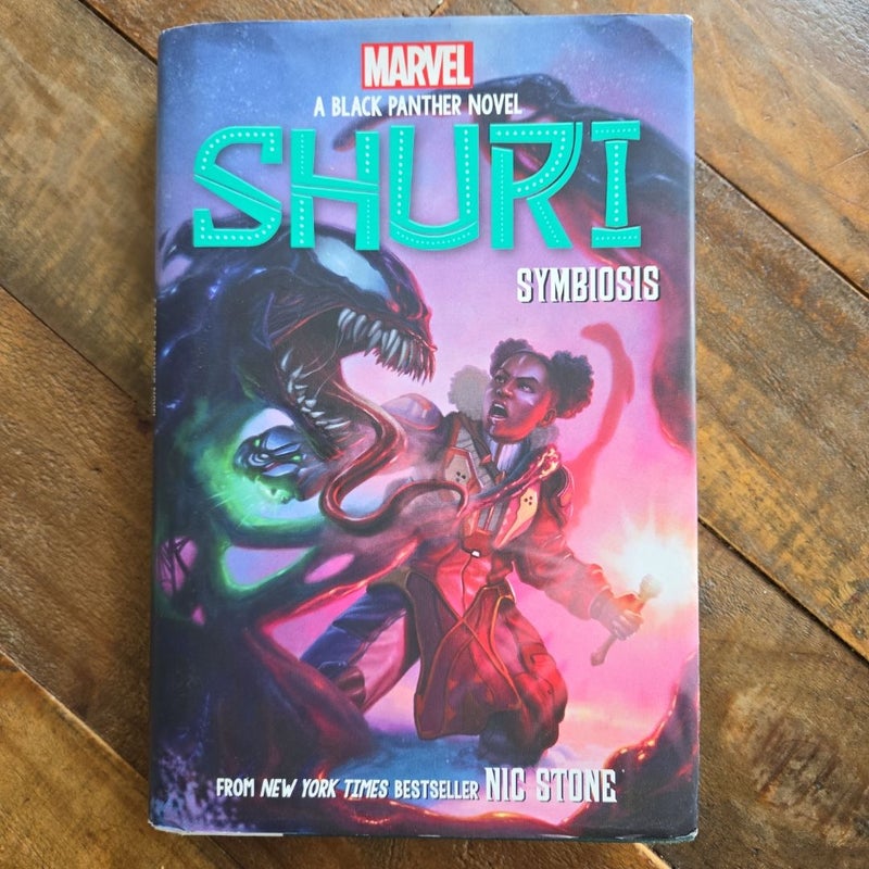 Shuri, Symbiosis