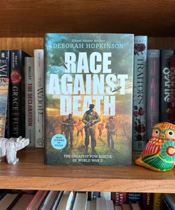 Race Against Death: the Greatest POW Rescue of World War II (Scholastic Focus)
