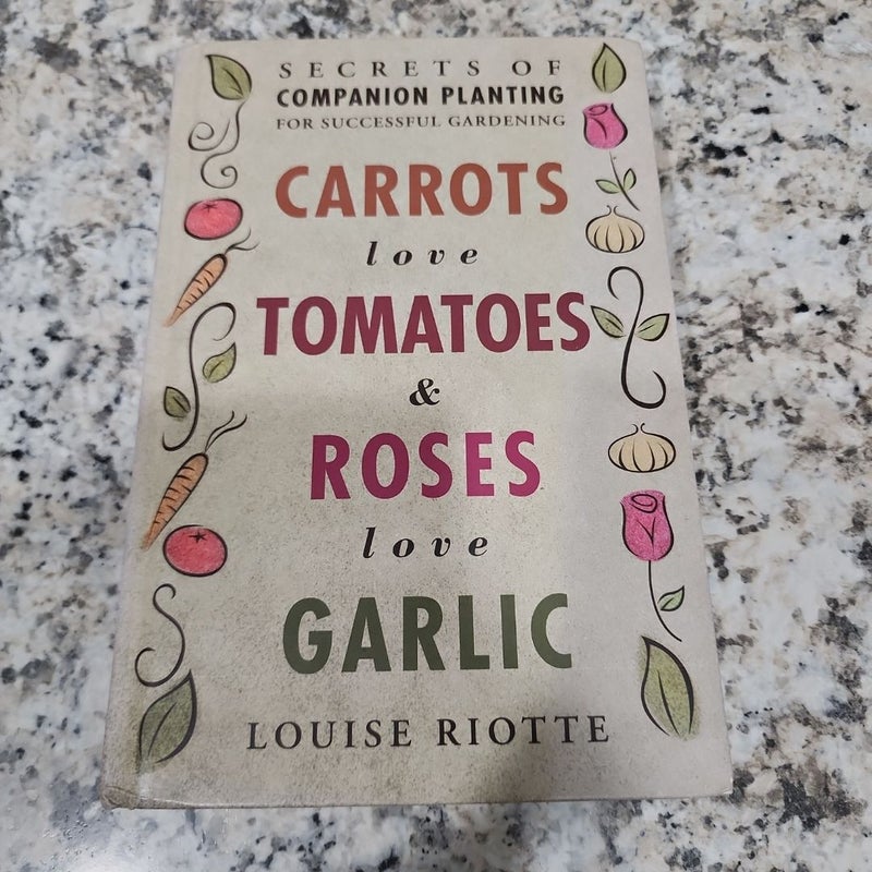 Carrots Love Tomatoes and Roses Love Garlic