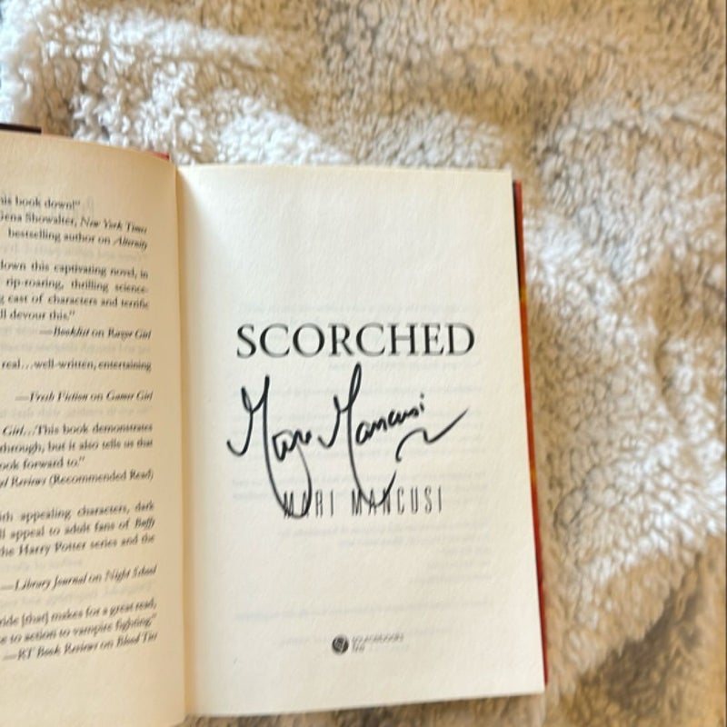 Scorched (signed)