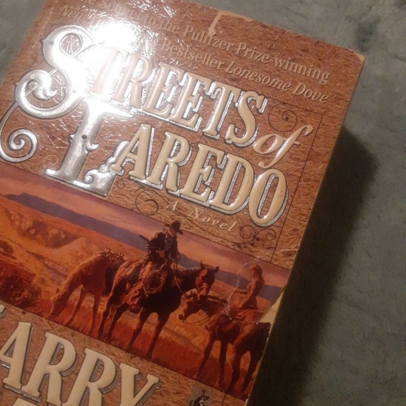 3 Lonesome Dove Series Books By Larry McMurtry, all mass market paperbacks! 
Lonesome Dove,
Streets Of Laredo -tint cover rips, 1 was taped. 
Comanche Moon - creased cover.

Books have some cover wear & spine creases. In good shape.