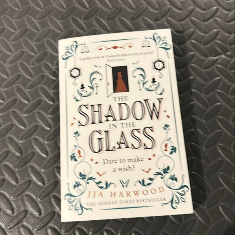 The Shadow in the Glass