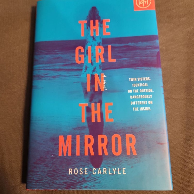 The Girl in the Mirror