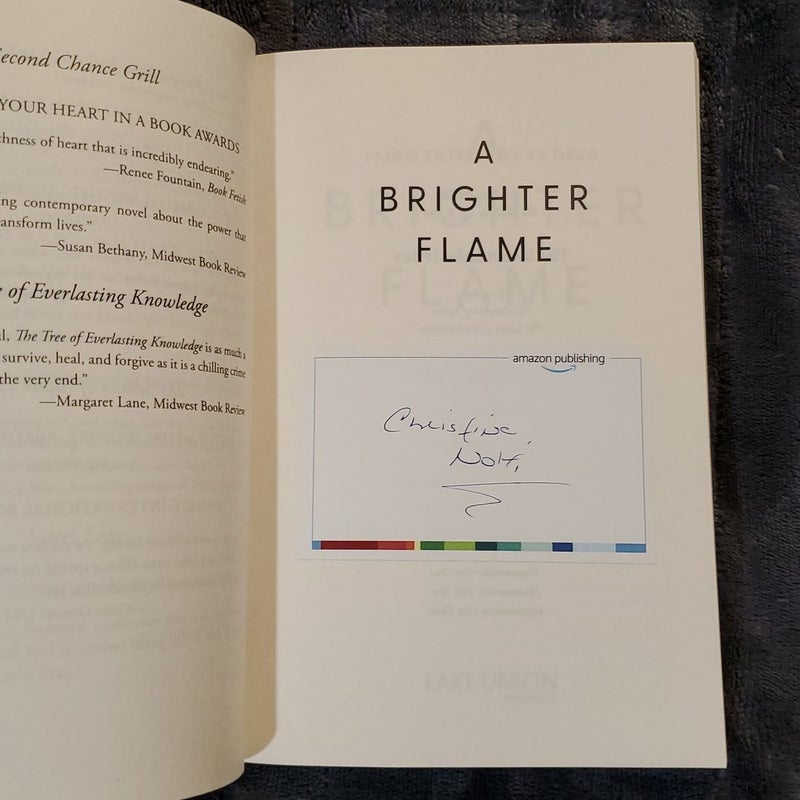 A Brighter Flame with signed bookplate 