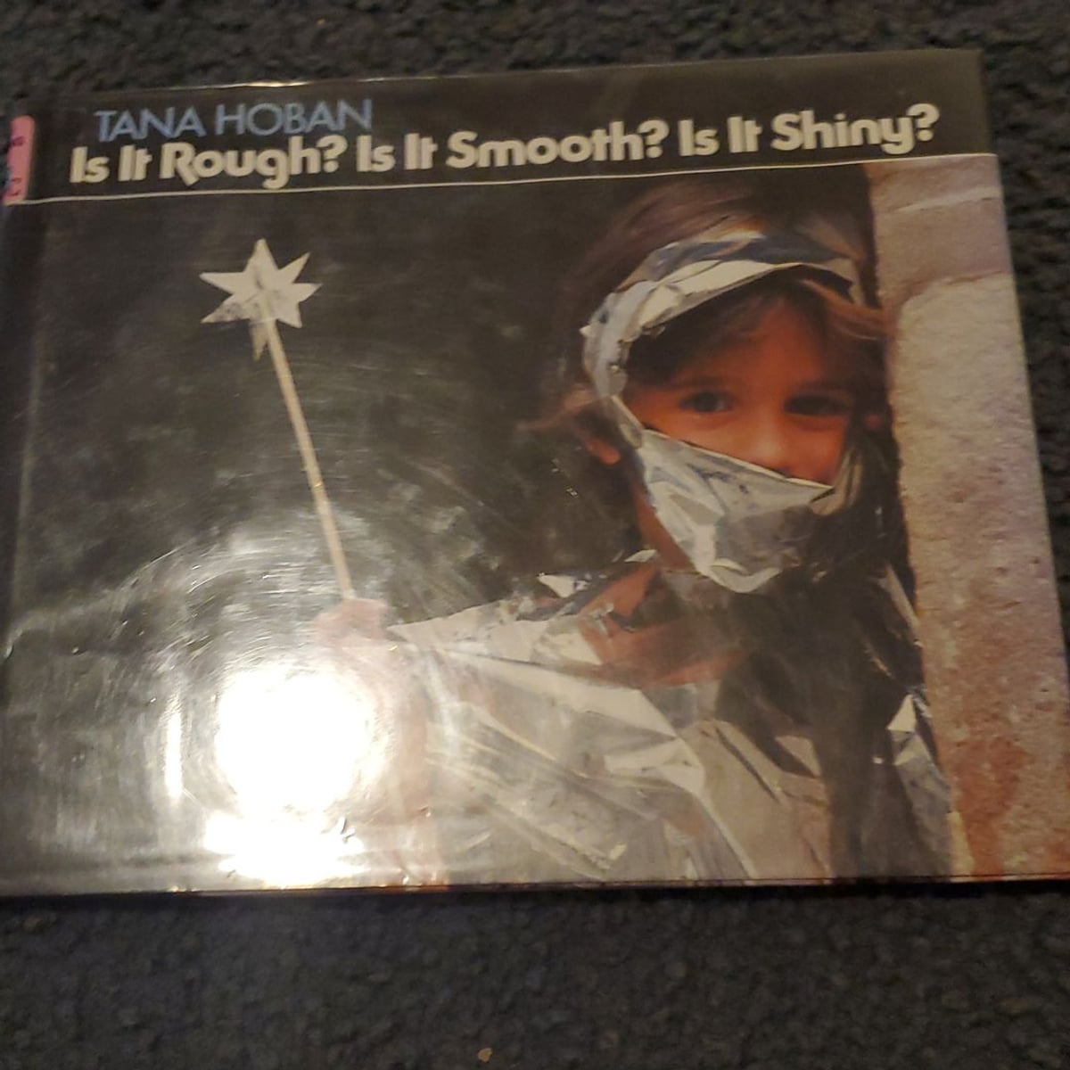 Is It Rough? Is It Smooth? Is It Shiny? by Tana Hoban