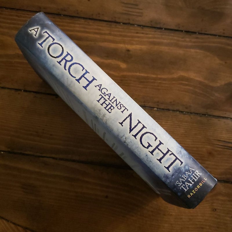 A Torch Against the Night (signed copy)
