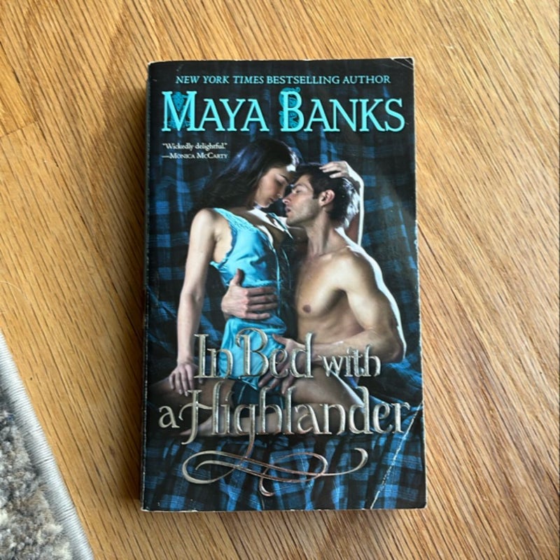 In Bed with a Highlander