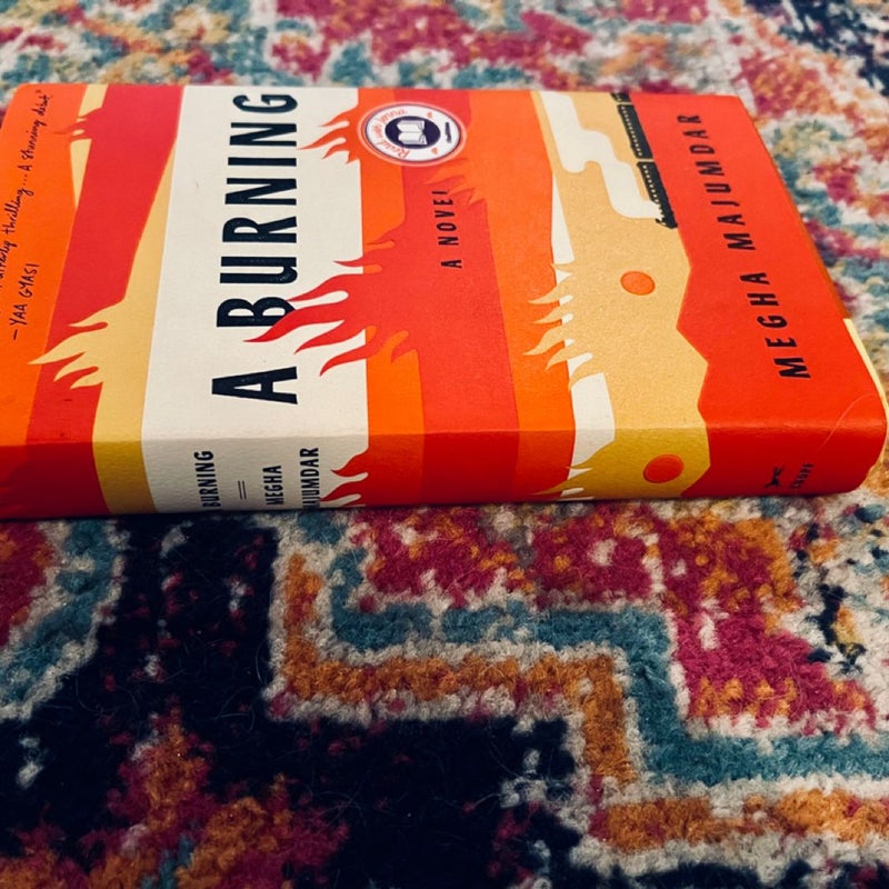 A Burning: A novel - Hardcover By Majumdar, Megha  Like New