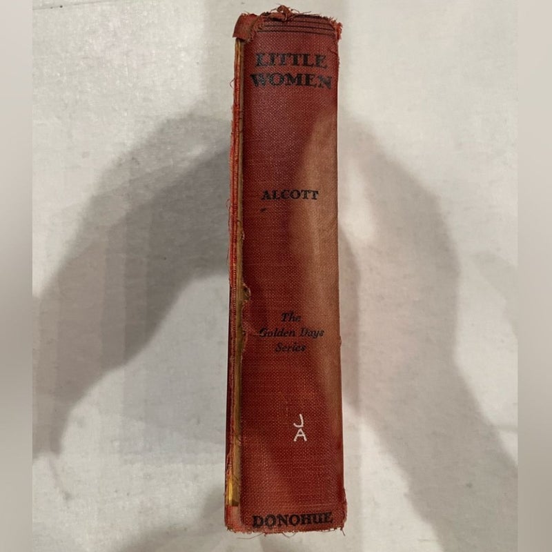 Antique Little Women red hardback book. By Louisa May Alcott. Used condition 