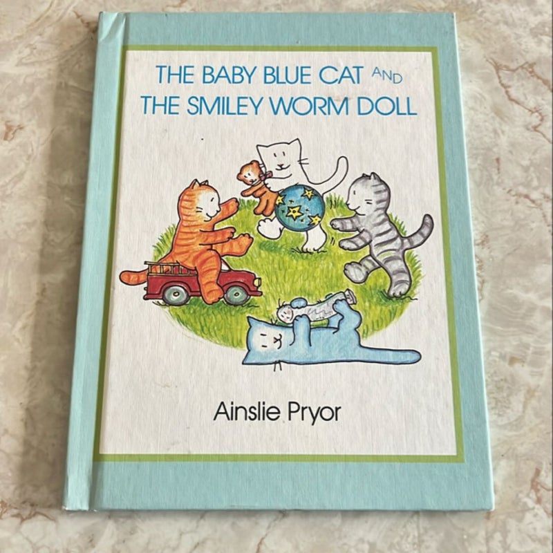 The Baby Blue Cat and the Smiley Worm Doll