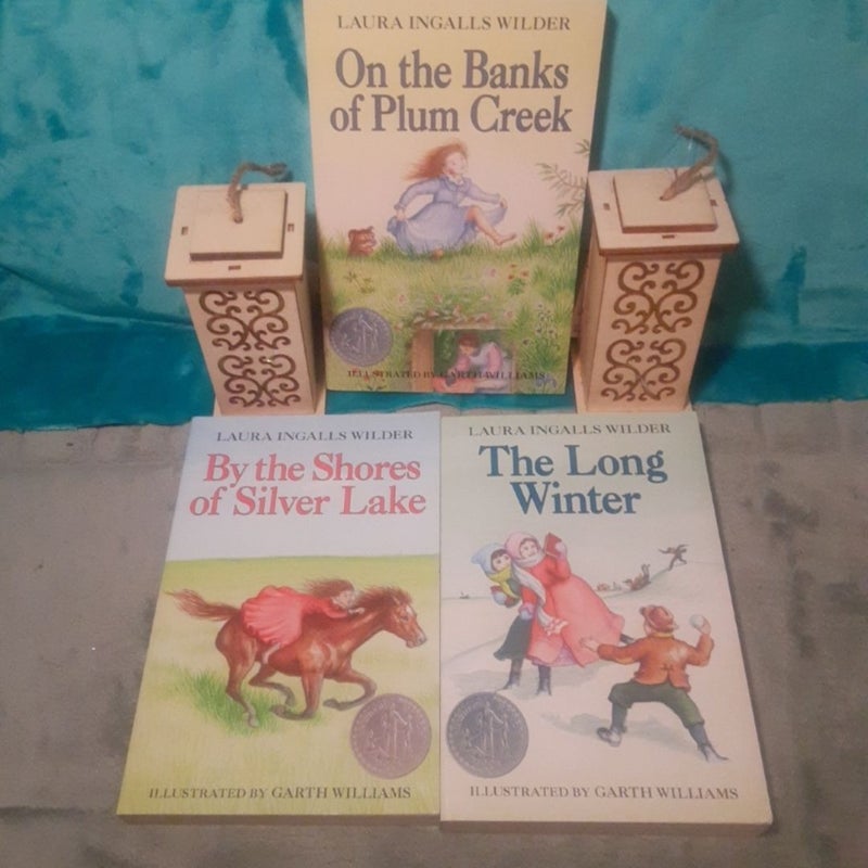 Complete Little House On The Prairie 9 paperback Book Set By Laura Ingalls Wilder! All have some cover wear. Big Woods & Farmer boy have some creases/ reading wear, other books in very good shape! =0


Little House in the Big Woods - creases on cover, spine,& pages, good shape.


Farmer Boy - some spine creases, good shape.


Little House on the Prairie - very good shape.


On the Banks of Plum Creek -indent on spine (made like that) otherwise very good shape.


By the Shores of Silver Lake - vg shape.


The Long Winter - vg shape.


Little Town on the Prairie - vg shape.


These Happy Golden Years - vg shape.


The First Four Years - vg shape.

