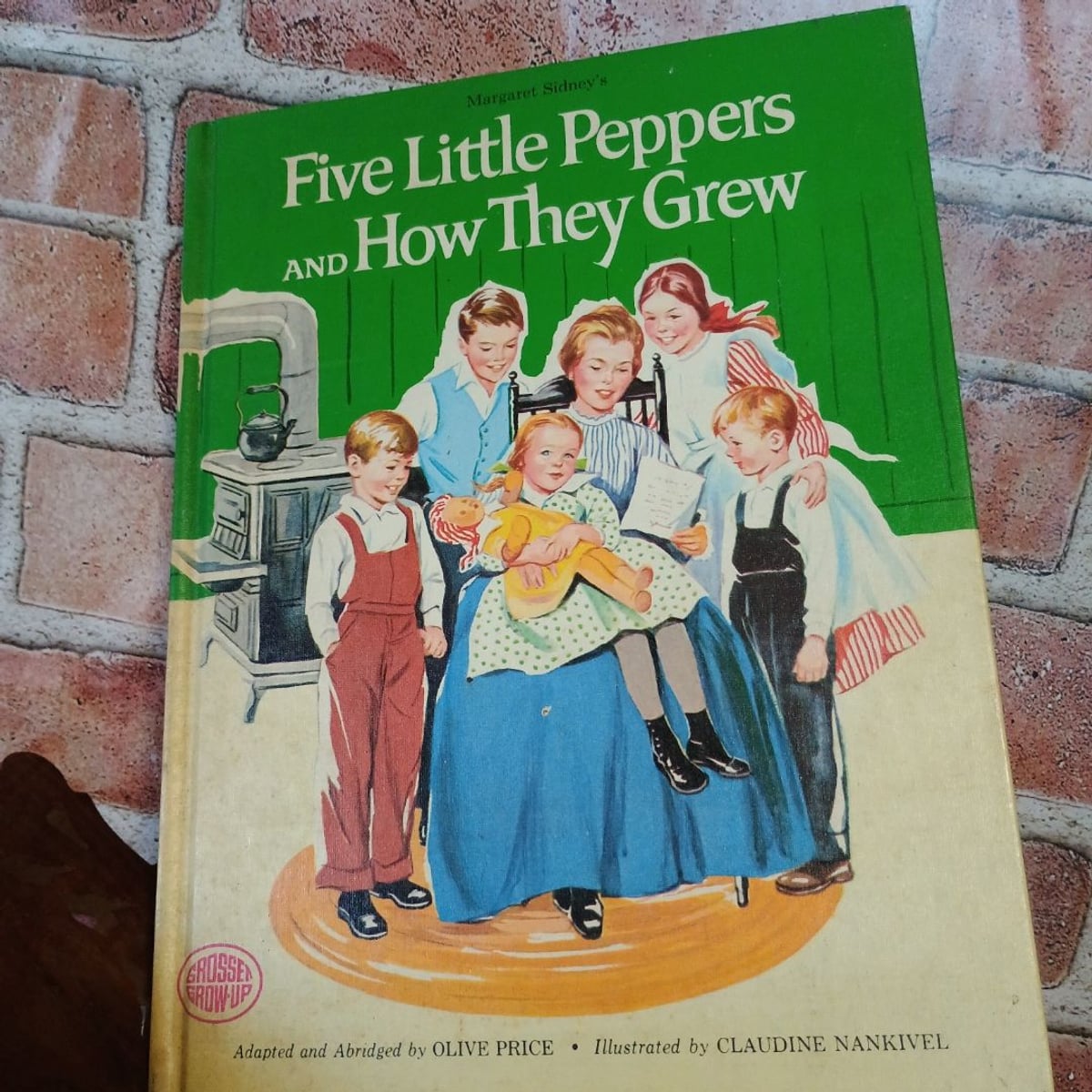 Five little peppers and how they grew by Scholastic, Hardcover
