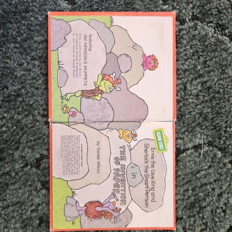Ernie the Cave King and Sherlock the Smart Person in The Invention of Paper