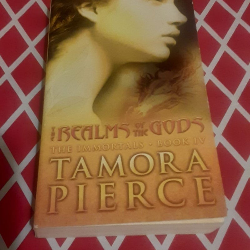 Immortals 4 The Realm of the Gods by Tamora Pierce paperback book, cover dings on back cover. Some reading wear. Good shape =0