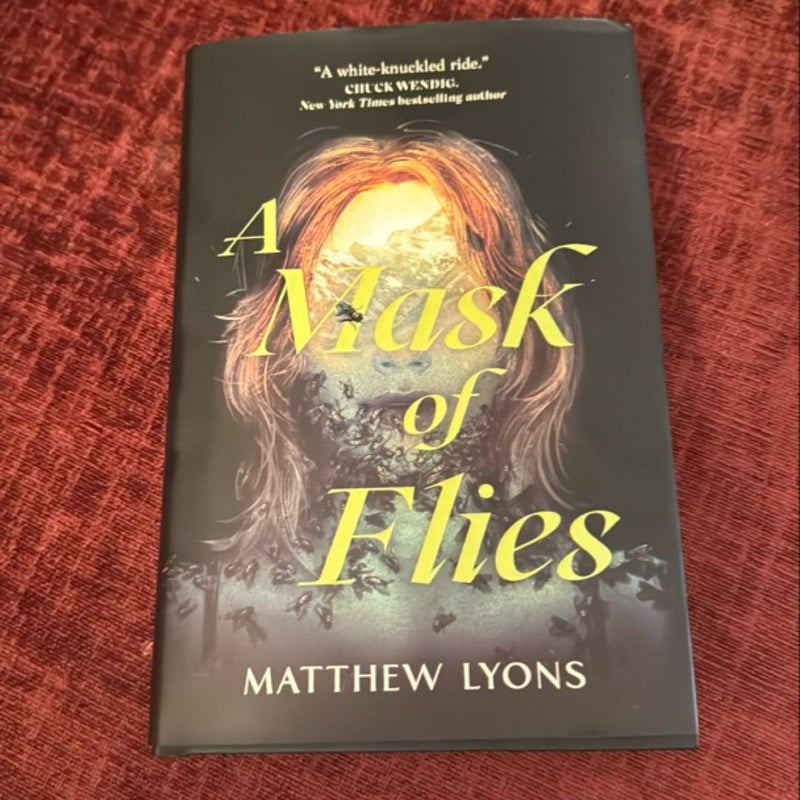 A Mask of Flies