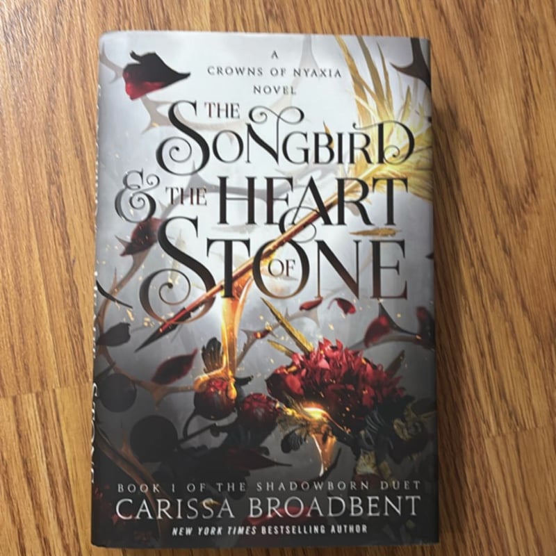 The Songbird and the Heart of Stone by , Hardcover