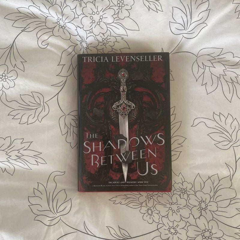 The Shadows Between Us Hardcover