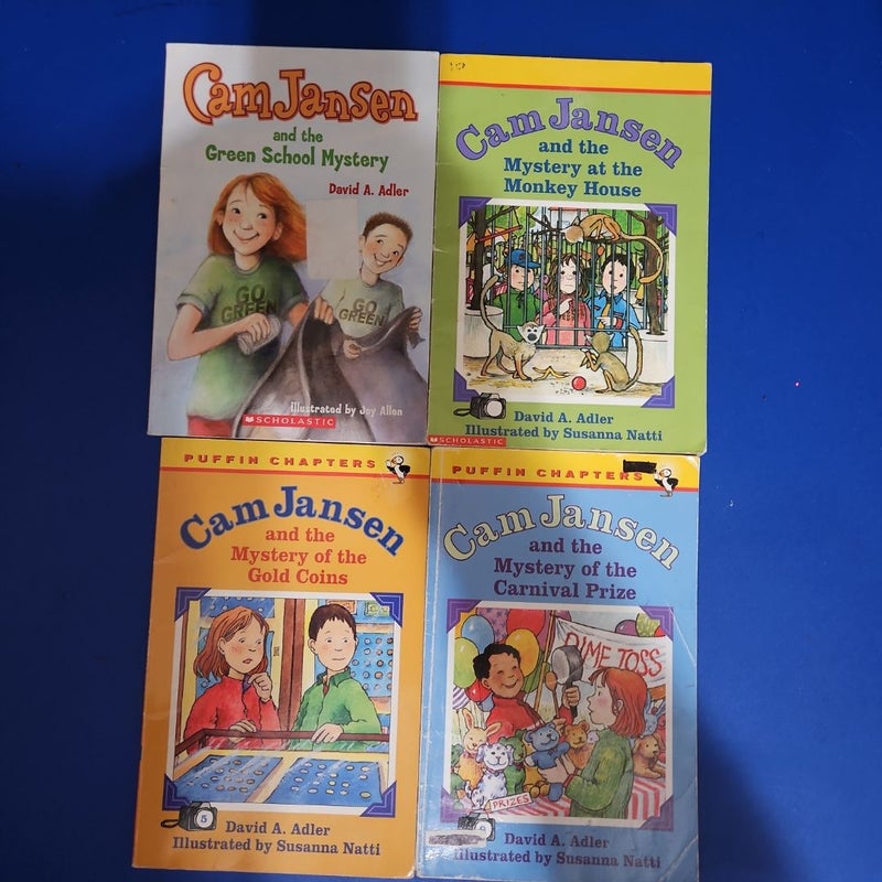 Cam Jansen 4-Pack which includes CAM JANSEN and the Green School Mystery, CAM JANSEN and the Mystery at the Monkey House, CAM JANSEN and the Mystery of the Gold Coins, & CAM JANSEN and the Mystery of the Carnival Prize