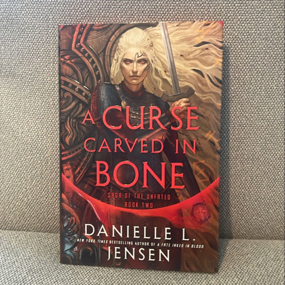 A Curse Carved in Bone (Signed)