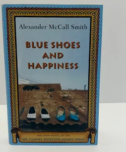 Blue Shoes and Happiness (1st Edition, Ladie’s Detective Agency Series,Book 7)