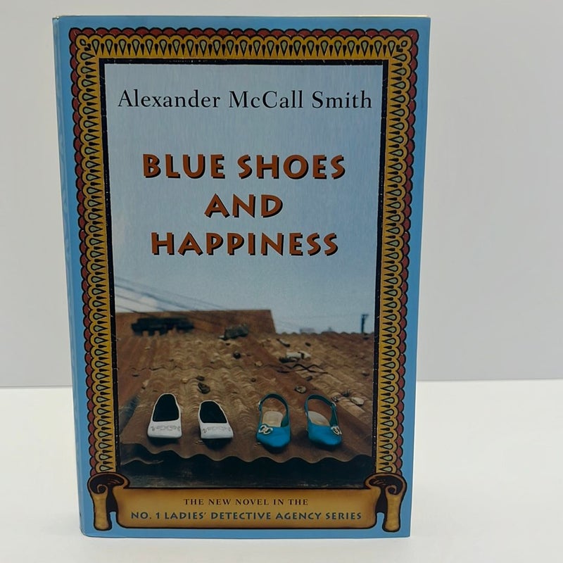 Blue Shoes and Happiness (1st Edition, Ladie’s Detective Agency Series,Book 7)