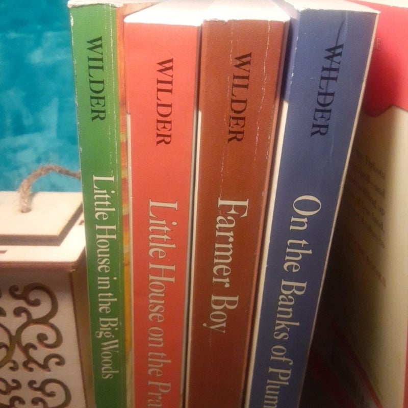 Complete Little House On The Prairie 9 paperback Book Set By Laura Ingalls Wilder! All have some cover wear. Big Woods & Farmer boy have some creases/ reading wear, other books in very good shape! =0


Little House in the Big Woods - creases on cover, spine,& pages, good shape.


Farmer Boy - some spine creases, good shape.


Little House on the Prairie - very good shape.


On the Banks of Plum Creek -indent on spine (made like that) otherwise very good shape.


By the Shores of Silver Lake - vg shape.


The Long Winter - vg shape.


Little Town on the Prairie - vg shape.


These Happy Golden Years - vg shape.


The First Four Years - vg shape.

