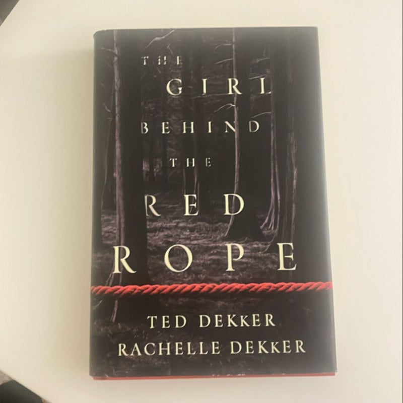 The Girl Behind the Red Rope