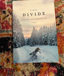 The Divide by Petersheim, Jolina - Trade PB VERY GOOD