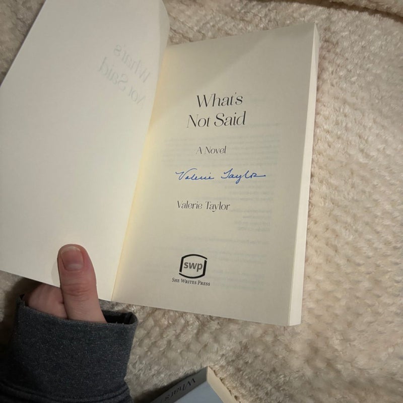 What's Not Said (signed) 