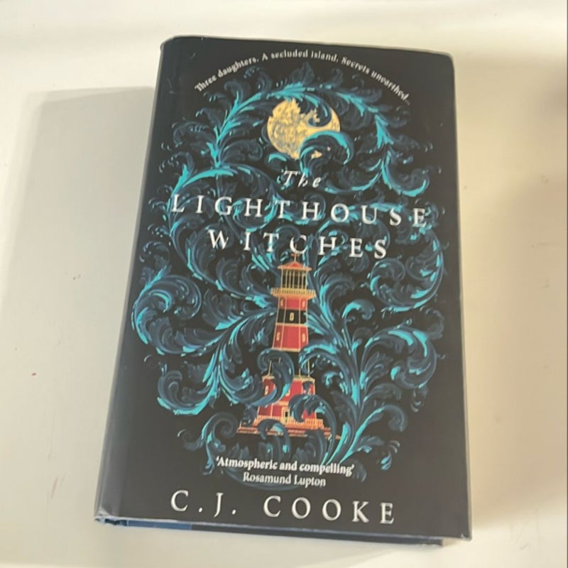 UK EDITION The Lighthouse Witches