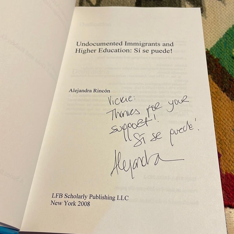 Undocumented Immigrants and Higher Education (signed by author)