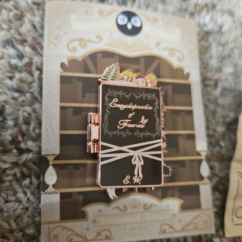 Owlcrate Emily Wildes Encyclopedia  of Faeries Exclusive  treasure tome Pin and metal dog book