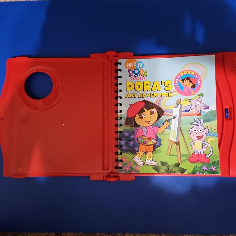 Nick Jr. Presents...DORA THE EXPLORER Story Reader Set - Includes Story Reader Device (fully operational) and three Read-Along Books, "Dora's Garden Adventure," "Dora's Art Adventure," & "The Gingerbread Boy," with their Companion Cartridge