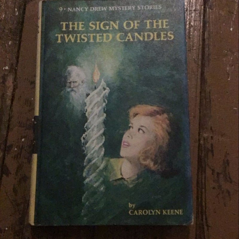 The Sign of the Twisted Candles