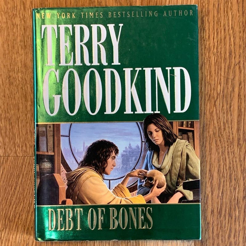 Debt of Bones (First Edition)