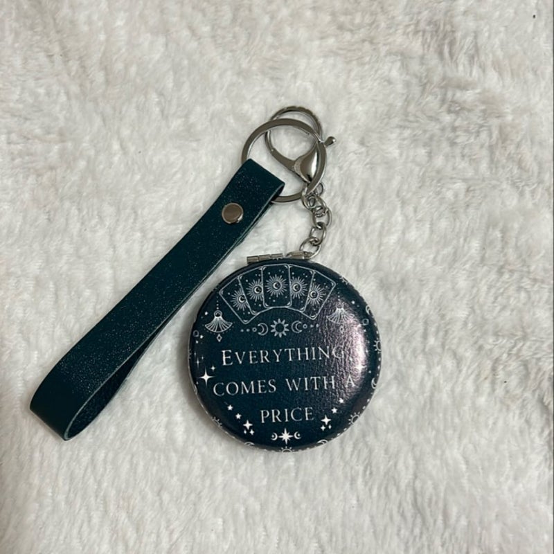 Evocation keychain mirror