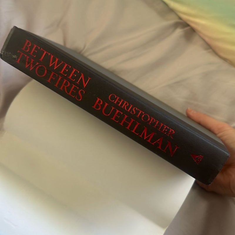 Between Two Fires