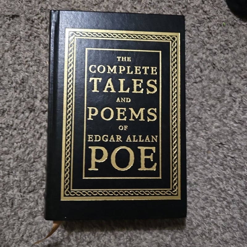 The complete tales and poems of Edgar Allen Poe with gold pages