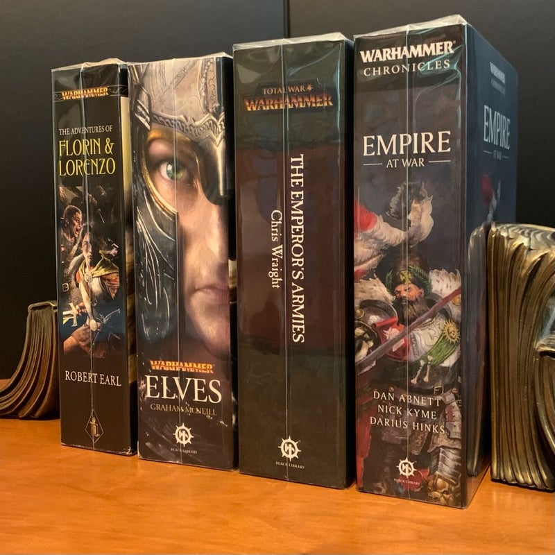 Warhammer Fantasy Omnibus Set: The Adventure of Florin & Lorenzo, Elves, The Emperor’s Armies, Empire at War: Contains the Novels: The Burning Shore, Wild Kingdoms, Savage City, Defenders of Ulthuan, Sons of Ellyrion, Guardians of the Forest, Sword of Vengeance, Sword of Justice, Riders of the Dead, Grimblades, Warrior Priest, Swords of the Empire, and many short stories