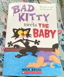 Bad kitty meets the baby