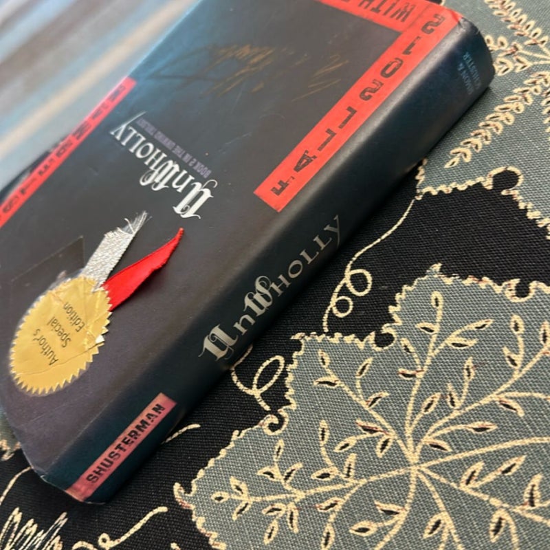 UnWholly (Numbered 464/500, Signed Special Edition)