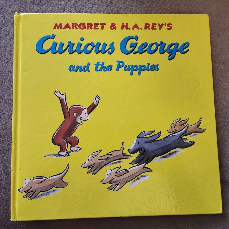 Curious George and the Puppies 