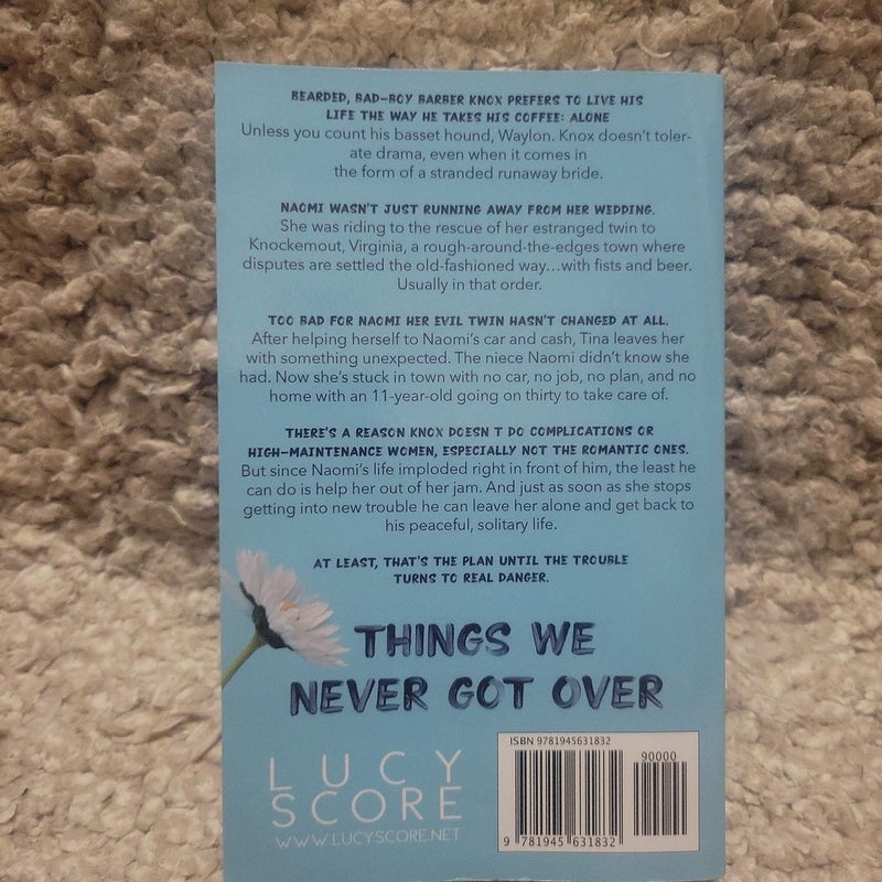  Things We Never Got Over (Knockemout): 9781945631832: Score,  Lucy: Books