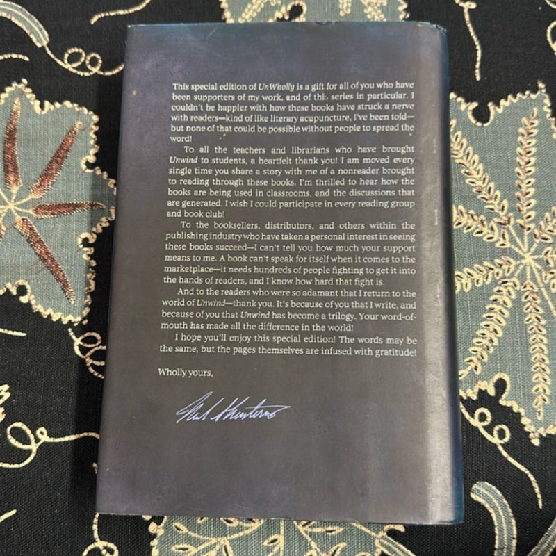 UnWholly (Numbered 464/500, Signed Special Edition)
